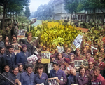 American servicemen and women gathered in front of 