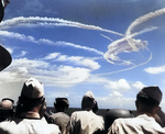 Aircraft trails above Task Force 58 during the Battle of the Philippine Sea, 19 Jun 1944; photographed aboard light cruiser Birmingham