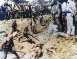 Japanese soldiers killing Chinese prisoners of war with bayonets in a trench, Nanjing, China, Jan 1938