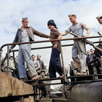 US Marines unloading Japanese prisoner of war from a submarine, May 1945