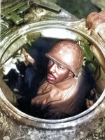 M4 Sherman tank machine gunner US Army Corporal Carlton Chapman in his tank near Nancy, France, 5 Nov 1944