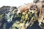 US Army soldiers resting at Pointe du Hoc, Normandy, France, 6 Jun 1944