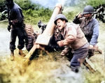 American 105mm Howitzer M3 shelling German forces near Carentan, France, 11 Jul 1944