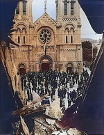 French civilians gathering in front of damaged Église Notre-Dame-du-Vœu, Cherbourg, France, 22 Aug 1944