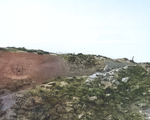 Shell damage to a German concrete 37mm gun emplacement on Utah Beach, Normandy; photo taken 15 Sep 1944