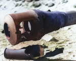 Damaged muzzle brake of a German 88mm gun, located in one of Utah Beach