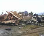 Destroyed US Army aircraft at Wheeler Field, Oahu, during post-Pearl Harbor raid clean up, Dec 1941; note P-40 parts in the pile