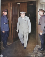 British Prime Minister Winston Churchill departing the conference room in Cecilienhof, Potsdam, Germany, 17 Jul 1945; note Soviet guards