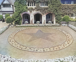 Courtyard of Cecilienhof Palace, Potsdam, Germany, 13 Jul 1945; note star formed by red begonias