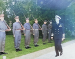 Fleet Admiral Ernest King inspecting the honor guard of British Scots Guards regiment during the Potsdam Conference, Germany, 23 Jul 1945