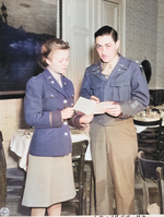 Major John Lennox and Lieutenant May Felts discussing the day