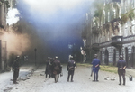 SS troops observing the block of Nowolipie Street between Smocza and Karmelicka Streets burning, Warsaw, Poland, Apr-May 1943