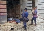 Ukranian troops of a SS auxiliary unit looking at executed Jews in Warsaw, Poland, Apr-May 1943