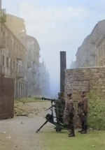 German troops with MG 08 heavy machine gun near the intersection of  Nowolipie and Smocza Streets in Warsaw, Poland during the Warsaw Ghetto Uprising, 1943