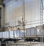 Workers loading uranium slugs into the X-10 Graphite Reactor