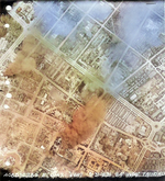 Taihoku General Government Building (near bottom of photograph) under aerial attack, Taihoku (now Taipei), Taiwan, 31 May 1945