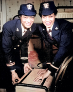 African-American US Navy WAVE Lt. (jg) Harriet Ida Pickens and Ens. Frances Wills posing at their quarters at Naval Reserve Midshipmen