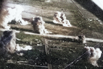 Carrier aircraft of Task Force 38 attacking the Japanese Army airfield at Takao (now Kaohsiung), Taiwan, 12 Oct 1944, photo 2 of 4; US intelligence referred to this field as 