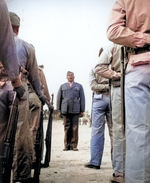 A platoon of African-American US Marine Corps recruits listening to drill instructor Sergeant Gilbert Hubert Johnson, Montford Point Camp, North Carolina, United States, Apr 1943