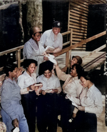 African-American US Army nurses receiving mail from home, 268th Station Hospital, Australia, 29 Nov 1943; 3 of the nurses were Lts. Prudence L. Burns, Inez Holmes, and Birdie E. Brown