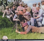 US soldiers instructing Chinese soldiers on the use of a 60-mm mortar at the Kunming Infantry School, Yunnan Province, China, 23 Sep 1944