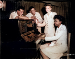 African-American US Army soldiers and American Red Cross workers in Assam, India, 23 Aug 1944; L to R: Cpl Robert Barttow, Pvt James Montgomery, Jeannette C. Dorsey, and Willie Lee Johnson