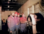 African-American US Army Private Harry Mills of the Mill Brother jazz quartet putting on a song at a jukebox, Fort Custer, Michigan, United States, 1943