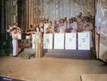 Josephine Baker singing the American national anthem before an African-American US Army band directed by Technical Sergeant Frank W. Weiss, Municipal Theater, Oran, Algeria, 17 May 1943