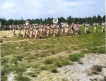 Japanese-American members of US 442nd Regimental Combat Team marching band during the first formal review of the regiment, Camp Shelby, Mississippi, United States, 1943