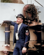 African-American sailor aboard destroyer escort Otter, circa Mar 1945