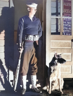 US Coast Guard sentry and dog at their post during WW2