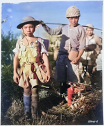 10-year-old Chinese soldier at Myitkyina airfield, Burma awaiting a transport aircraft to take his unit back to China, mid-1944 (photo production date 5 Dec 1944)