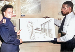 Russian Army Captain Orset Chevstov receiving a painting from African-American merchant seaman and artist George Wright, 18 Aug 1944; note painting theme of Russo-American cooperation