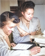 African-American US Army WAAC Lieutenants Harriet West and Irma Clayton working on a recruitment schedule report, Temp Bldg M of WAAC Headquarters, 26th St, Washington, DC, United States, 1942