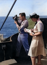 A WAVES ensign timing the sights for USS General Omar Bundy