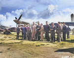 Claire Chennault with Chinese officers at an airfield, Kunming, Yunnan Province, China, 1942-1943; note P-40 fighters