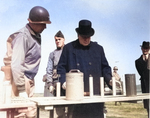 Winston Churchill being shown various weapons, England, United Kingdom, 15 May 1944, photo 1 of 2; note Major General Edward Brooks in background