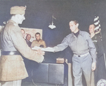 Generalleutnant Fridolin von Senger und Etterlin surrendering to General Mark Clark at US 15th Army Group Headquarters, Italy, 4 May 1945