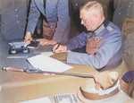 Wilhelm Keitel signing surrender documents at the Soviet headquarters near Berlin, Germany, 8 May 1945