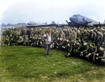 US Army Brigadier General Anthony C. McAuliffe speaking to his glider pilots, England, United Kingdom, 18 Sep 1944; note C-47 Skytrain and CG-4A glider aircraft in background