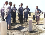 Admiral Chester Nimitz at the US Marine Corps cemetary on Namur Island, Kwajalein Atoll, 6 Feb 1944; also present were USMC Colonel Franklin Hart and Major General Harry Schmidt (with dark glasses)