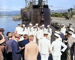 Nimitz having just presented Navy Cross award to Ensign Fisler aboard USS Grayling, Pearl Harbor, US Territory of Hawaii, 31 Dec 1941; Admiral Kimmel at right