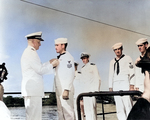 Admiral Nimitz presenting the Navy Cross award to Aviation Machinist