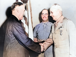 US Secretary of War Henry Stimson awarding Lieutenant General Delos Emmons the Distinguished Service Medal, Jul 1943; Brigadier General H. B. Lewis in background