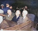 US President Harry Truman, Secretary of State James Byrnes, and Ambassador to Belgium Charles Sawyer in a car, Antwerp, Belgium, 15 Jul 1945, photo 1 of 2