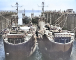 USS ABSD-1 with USS LSM-67, USS LSM-218, USS LSM-269, and USS LSM-219 in the dock, Espiritu Santo, New Hebrides, 17 Nov 1944, photo 1 of 2