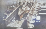 USS ABSD-1 with USS California in the dock, Espiritu Santo, New Hebrides, circa 8 Sep 1944