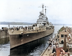 USS ABSD-1 with USS Columbia in the dock, Espiritu Santo, New Hebrides, Jan 1944