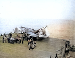 FM-1 aircraft having crashed into several TBF aircraft while landing on the flight deck of USS Coral Sea, 11 Oct 1943, photo 2 of 3