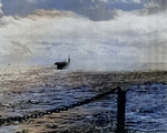 USS Coral Sea seen from USS Natoma Bay, 13 Jan 1944